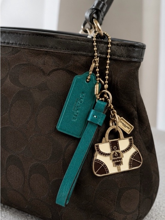 Coach Handbags - Coach teal leather bag charm